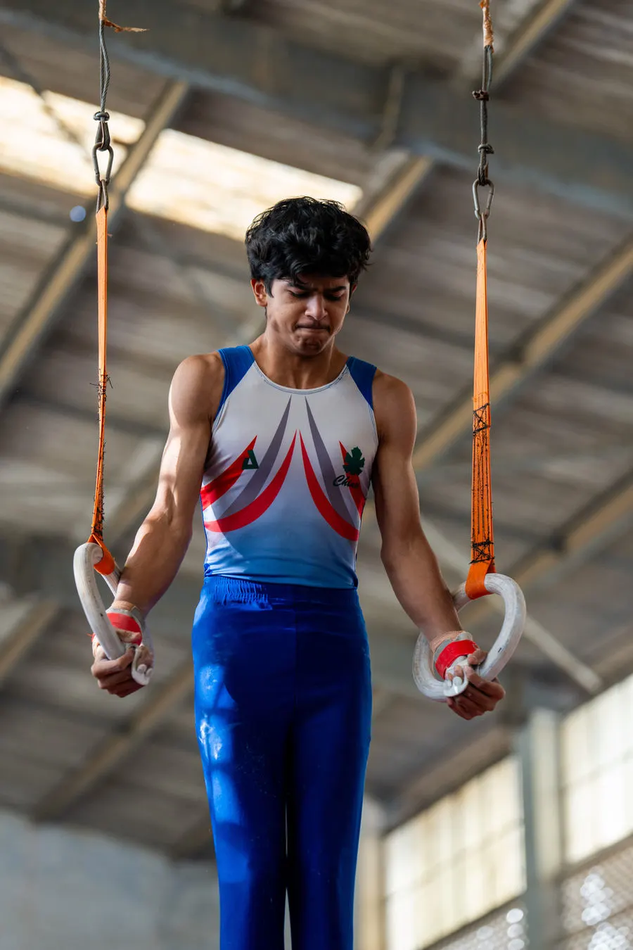 Gymnast holding still on the rings